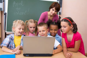 Studnets using a laptop