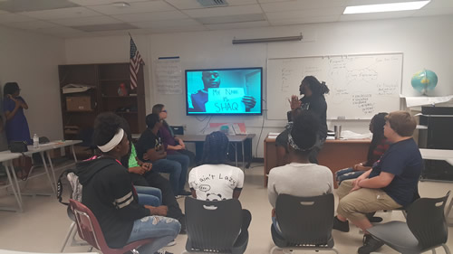 Broward County teacher doing a lesson and showing a video for Black History Month.