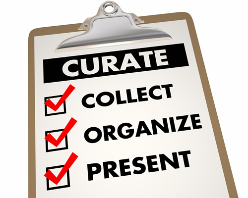 A clipboard with the words curate, collect, organize, and present