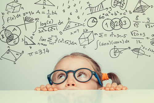 an adorable pigtailed girl looking up at a bunch of math equations