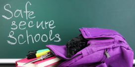a purple backpack, school books, and the words "safe secure schools"