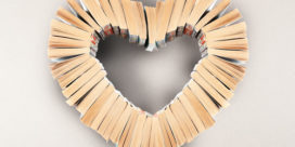 a group of books shaped into a heart