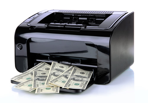 A printer printing money illustrates the concept of how printing processes can be amended to find funding for student programs.