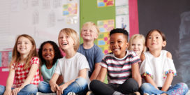 Learn how one Arizona speech language pathologist is using a technology platform to teach social learning to students with autism and pragmatic language disorders, like these smiling students in class.
