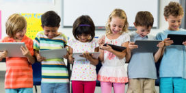 The digital classroom never stays the same--here's what educators say is most important for their students' engagement and learning, like these smiling students using tablets.