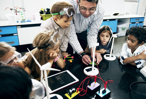 These students are working in a lab with circuits and robotics to avoid rural brain drain.