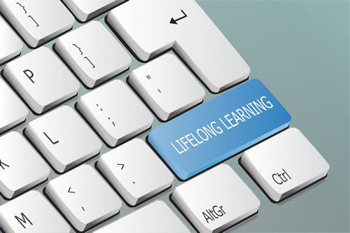A computer keyboard displays the a key titled lifelong learning.