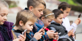 Engaging and relevant exercises delivered via anytime, anywhere edtech tools can help students learn to write effectively and leave so-called social media speak behind, like these students texting.