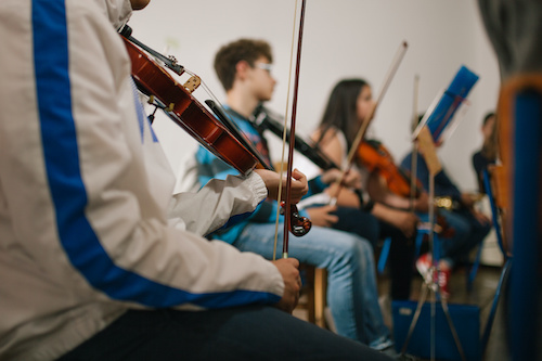 Community partnerships and impactful programs extend the reach of music education well beyond the classroom walls.
