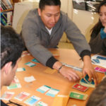 Recent high school graduate Edwin Brito plays the pilot version of USC's Pathfinder game.