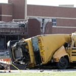 School buses are shown after being tossed by a tornado in the parking lot of damaged Lake High School in Lake Township, Ohio Sunday, June 6, 2010 (AP).