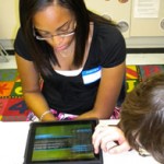 Students test-drive the apps on the iPad. Photo courtesy of Pearson.